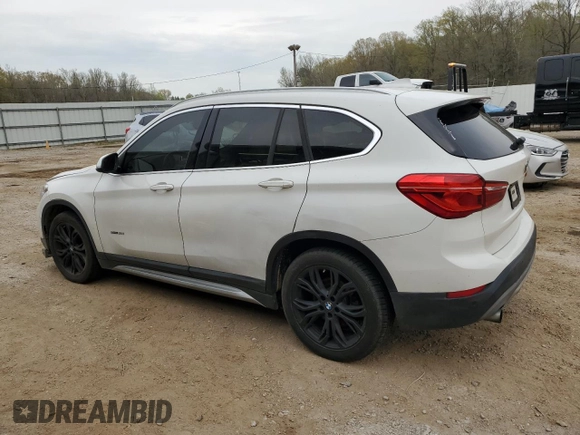 2017 BMW X1 sDrive28i with VIN WBXHU7C30H5H38049, listed as a Copart auction lot 51007915 with 52,963 mi miles and Salvage Title. Bid and sale history available at carsss.com. Image 2.