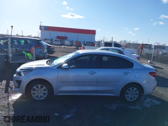 2023 Kia Rio LX with VIN 3KPA24ADXPE606463, listed as a IAAI auction lot 41728523 with 8,909 mi miles and . Bid and sale history available at DreamBid. Image 14.