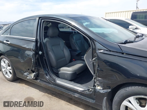 2012 Hyundai Sonata SE z VIN 5NPEC4AC6CH423122, wystawiony jako IAAI lot #41879178 z przebiegiem 64 681 mil mil oraz . Historia ofert i sprzedaży dostępna na DreamBid. Obrazek 14.