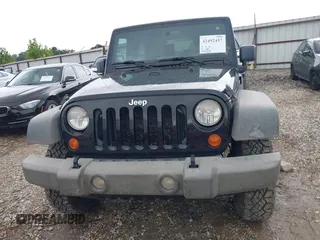 2007 Jeep Wrangler X with VIN 1J4FA24187L179428, listed as a IAAI auction lot 42492457 with 148,208 mi miles and . Bid and sale history available at DreamBid. Image 12.