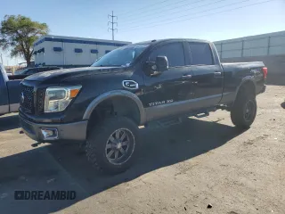 2016 Nissan Titan SL z VIN 1N6BA1F41GN508901, wystawiony jako Copart lot #56513755 z przebiegiem 73 175 mil mil oraz Czysty tytuł • Clean title. Historia ofert i sprzedaży dostępna na DreamBid. Obrazek 1.