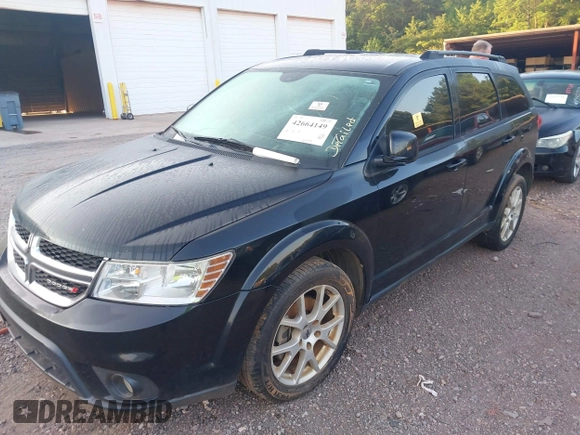 2015 Dodge Journey SXT with VIN 3C4PDCBG7FT556929, listed as a IAAI auction lot 42664149 with 191,980 mi miles and . Bid and sale history available at DreamBid. Image 2.