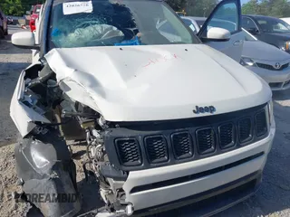 2021 Jeep Compass Altitude with VIN 3C4NJDBB2MT596181, listed as a IAAI auction lot 42026716 with 69,526 mi miles and . Bid and sale history available at DreamBid. Image 10.
