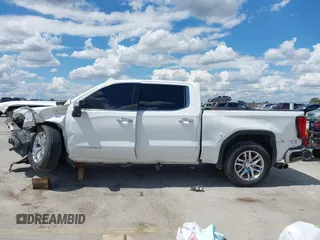 2019 GMC Sierra 1500 SLT z VIN 3GTP8DED7KG268973, wystawiony jako IAAI lot #42224064 z przebiegiem 98 871 mil mil oraz . Historia ofert i sprzedaży dostępna na DreamBid. Obrazek 15.