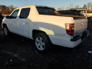2012 Honda Ridgeline RTL with VIN 5FPYK1F57CB001679, listed as a Copart auction lot 85725924 with 80,916 mi miles and Salvage Title. Bid and sale history available at carsss.com. Image 2.
