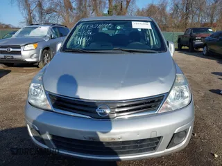 2011 Nissan Versa 1.8 S with VIN 3N1BC1AP5BL432979, listed as a IAAI auction lot 41932890 with 150,041 mi miles. Bid and sale history available at carsss.com. Image 6.