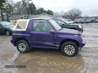 1993 Suzuki Sidekick z VIN 2S3TA01C4P6406238, wystawiony jako IAAI lot #41469419 z przebiegiem 126 667 mil mil oraz . Historia ofert i sprzedaży dostępna na DreamBid. Obrazek 13.
