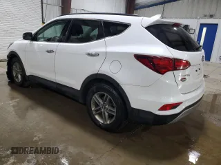 2017 Hyundai Santa Fe 2.4L with VIN 5NMZUDLB2HH005387, listed as a Copart auction lot 64592535 with 82,742 mi miles and Salvage title. Bid and sale history available at DreamBid. Image 2.