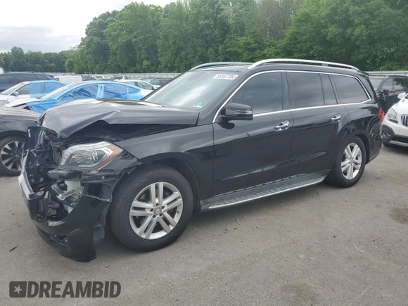 2015 Mercedes-Benz GL with VIN 4JGDF6EE7FA580014, listed as a Copart auction lot 55137704 with 115,624 mi miles and Salvage Title. Bid and sale history available at carsss.com. Image 1.