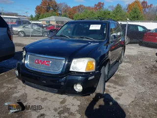 2006 GMC Envoy Denali with VIN 1GKET63M462257064, listed as a IAAI auction lot 40793921 with 179,304 mi miles. Bid and sale history available at carsss.com. Image 18.