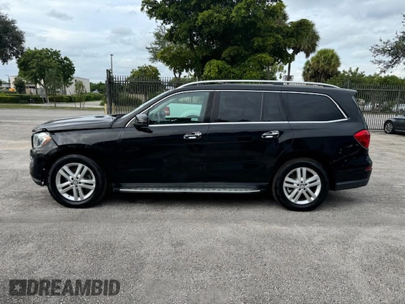 2016 Mercedes-Benz GL with VIN 4JGDF6EE1GA625384, listed as a Copart auction lot 77045634 with 104,938 mi miles and Salvage Title. Bid and sale history available at carsss.com. Image 12.