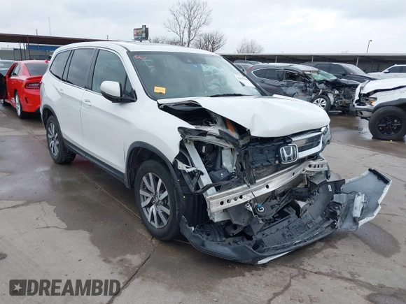 2021 Honda Pilot EX-L with VIN 5FNYF6H55MB031305, listed as a IAAI auction lot 41476636 with 58,754 mi miles. Bid and sale history available at carsss.com. Image 1.