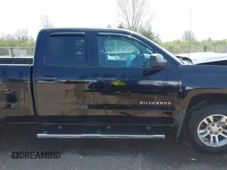 2014 Chevrolet Silverado 1500 LT with VIN 1GCVKREH9EZ282578, listed as a IAAI auction lot 42062801 with 163,158 mi miles and . Bid and sale history available at DreamBid. Image 13.