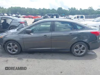 2018 Ford Focus SE with VIN 1FADP3FE2JL263954, listed as a IAAI auction lot 42480748 with 111,059 mi miles and . Bid and sale history available at DreamBid. Image 14.