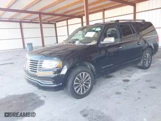 2015 Lincoln Navigator L with VIN 5LMJJ3JT0FEJ12569, listed as a IAAI auction lot 41909517 with 165,631 mi miles. Bid and sale history available at carsss.com. Image 16.