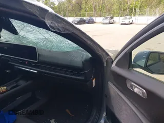 2024 Hyundai Ioniq 6 SEL z VIN KMHM34AC0RA076572, wystawiony jako IAAI lot #42188178 z przebiegiem 1 828 mil mil oraz . Historia ofert i sprzedaży dostępna na DreamBid. Obrazek 5.