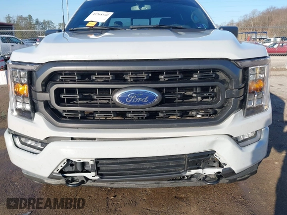 2023 Ford F-150 XL with VIN 1FTFW1E58PFB33406, listed as a IAAI auction lot 41768342 with 42,054 mi miles. Bid and sale history available at carsss.com. Image 17.