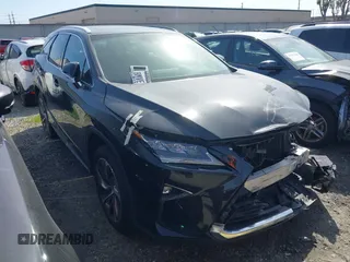 2019 Lexus RX 350L Premium z VIN JTJGZKCA0K2011427, wystawiony jako IAAI lot #41578080 z przebiegiem 77 252 mil mil oraz . Historia ofert i sprzedaży dostępna na DreamBid. Obrazek 1.