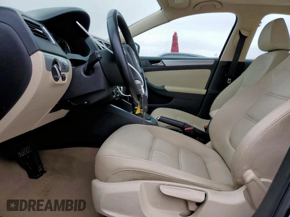 2012 Volkswagen Jetta TDI w/Premium with VIN 3VWLL7AJ6CM020286, listed as a Copart auction lot 45501185 with 131,028 mi miles and Salvage title. Bid and sale history available at DreamBid. Image 7.