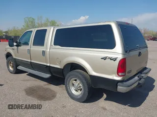 2001 Ford Super Duty F-250 XL with VIN 1FTNW21S71EA79137, listed as a IAAI auction lot 42115660 with 147,873 mi miles. Bid and sale history available at carsss.com. Image 3.