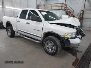 2004 Dodge 2500 SLT with VIN 3D7KU28D24G205956, listed as a IAAI auction lot 41990750 with 210,536 mi miles and . Bid and sale history available at DreamBid. Image 1.