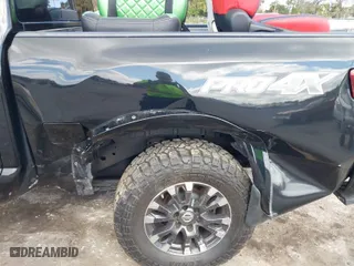 2017 Nissan Titan SV with VIN 1N6AA1E5XHN554086, listed as a IAAI auction lot 41463382 with 112,916 mi miles. Bid and sale history available at carsss.com. Image 6.