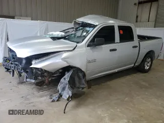 2018 Ram 1500 Tradesman with VIN 1C6RR6KTXJS340700, listed as a Copart auction lot 82818964 with Not provided miles and Salvage title. Bid and sale history available at DreamBid. Image 1.