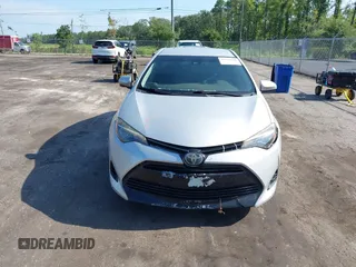 2018 Toyota Corolla L with VIN 5YFBURHEXJP810003, listed as a IAAI auction lot 42526648 with 84,546 mi miles and . Bid and sale history available at DreamBid. Image 13.