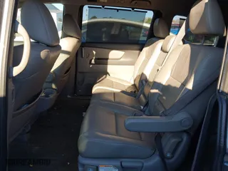 2013 Honda Odyssey Touring with VIN 5FNRL5H9XDB009973, listed as a IAAI auction lot 41904710 with 219,067 mi miles. Bid and sale history available at carsss.com. Image 8.
