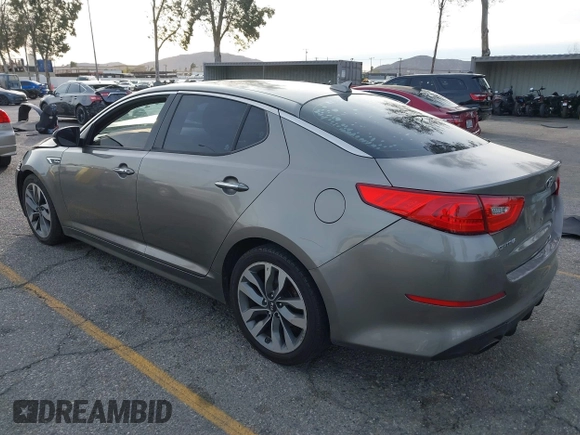 2014 Kia Optima SX Turbo with VIN 5XXGR4A63EG291596, listed as a IAAI auction lot 41385491 with 265,017 mi miles and . Bid and sale history available at DreamBid. Image 3.