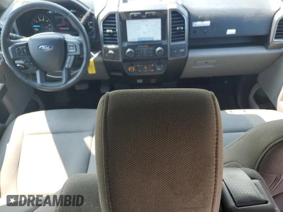 2019 Ford F-150 XL with VIN 1FTEW1EP7KFA47638, listed as a Copart auction lot 60193125 with 127,022 mi miles and Salvage title. Bid and sale history available at DreamBid. Image 8.
