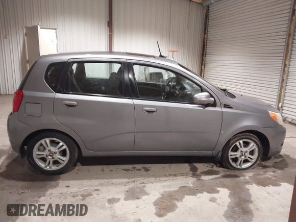 2009 Chevrolet Aveo 1LT with VIN KL1TD66E09B663679, listed as a IAAI auction lot 41911920 with 69,579 mi miles and . Bid and sale history available at DreamBid. Image 13.