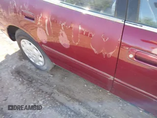 1996 Toyota Camry DX z VIN JT2BG12K4T0363844, wystawiony jako IAAI lot #42215996 z przebiegiem 214 452 mil mil oraz . Historia ofert i sprzedaży dostępna na DreamBid. Obrazek 12.