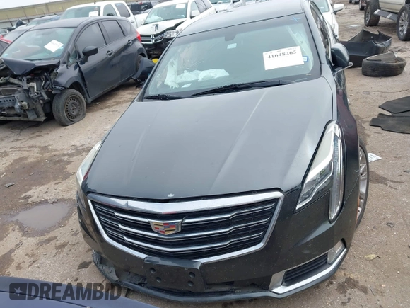 2018 Cadillac XTS Luxury with VIN 2G61M5S30J9164758, listed as a IAAI auction lot 41648265 with 173,134 mi miles and . Bid and sale history available at carsss.com. Image 13.