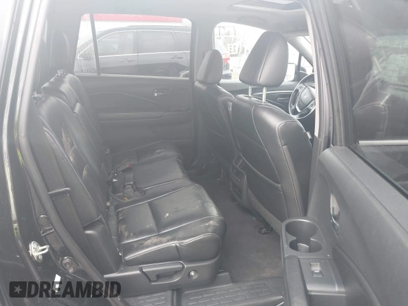 2016 Honda Pilot EX-L with VIN 5FNYF5H56GB031831, listed as a IAAI auction lot 41111342 with 244,197 mi miles and . Bid and sale history available at DreamBid. Image 8.