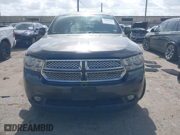 2013 Dodge Durango SXT with VIN 1C4RDHAG4DC686389, listed as a IAAI auction lot 42440260 with 166,952 mi miles and . Bid and sale history available at DreamBid. Image 12.