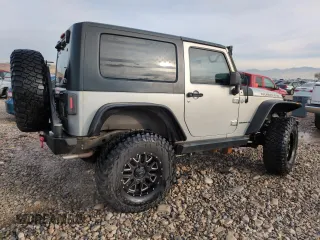 2007 Jeep Wrangler Rubicon z VIN 1J8GA64157L125319, wystawiony jako Copart lot #82929184 z przebiegiem 82 019 mil mil oraz Szkoda całkowita • Salvage title. Historia ofert i sprzedaży dostępna na DreamBid. Obrazek 3.