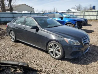 2014 Mercedes-Benz E 350 Luxury with VIN WDDHF8JB3EA910524, listed as a Copart auction lot 50233655 with 209,262 mi miles and Salvage Title. Bid and sale history available at DreamBid. Image 4.