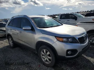 2012 Kia Sorento LX with VIN 5XYKT3A63CG300487, listed as a Copart auction lot 42238505 with 169,756 mi miles and Salvage Title. Bid and sale history available at DreamBid. Image 4.