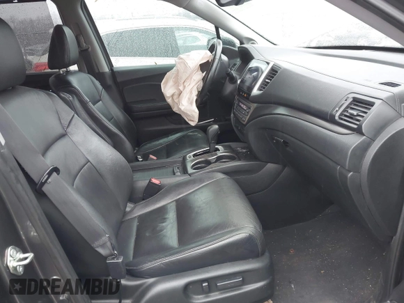 2017 Honda Pilot EX-L with VIN 5FNYF5H8XHB018480, listed as a IAAI auction lot 41049028 with 136,748 mi miles and . Bid and sale history available at DreamBid. Image 5.