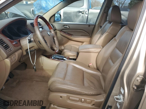 2004 Acura MDX Touring Pkg w/Navigation with VIN 2HNYD18834H504299, listed as a Copart auction lot 44749205 with 143,972 mi miles and Clean Title. Bid and sale history available at carsss.com. Image 7.
