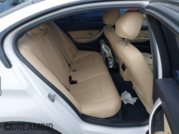 2018 BMW 3 Series 320i xDrive with VIN WBA8E5G52JNU46803, listed as a IAAI auction lot 41869625 with 67,057 mi miles. Bid and sale history available at carsss.com. Image 8.