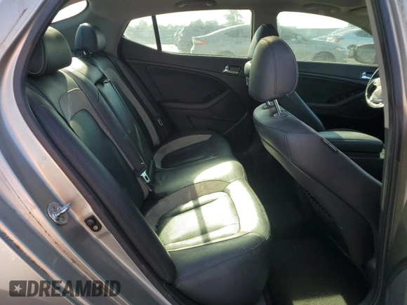 2011 Kia Optima SX z VIN KNAGR4A65B5161039, wystawiony jako Copart lot #57889545 z przebiegiem Nie podano mil oraz Szkoda całkowita • Salvage title. Historia ofert i sprzedaży dostępna na DreamBid. Obrazek 10.