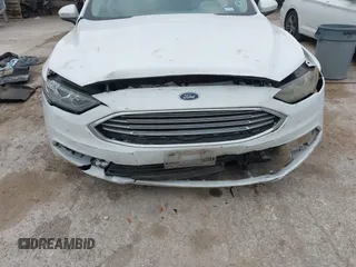 2018 Ford Fusion SE z VIN 3FA6P0HD1JR191576, wystawiony jako IAAI lot #42282669 z przebiegiem 73 439 mil mil oraz . Historia ofert i sprzedaży dostępna na DreamBid. Obrazek 6.