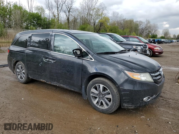 2014 Honda Odyssey Touring z VIN 5FNRL5H97EB508649, wystawiony jako Copart lot #55665245 z przebiegiem 162 892 mil mil oraz Czysty tytuł • Clean title. Historia ofert i sprzedaży dostępna na DreamBid. Obrazek 4.