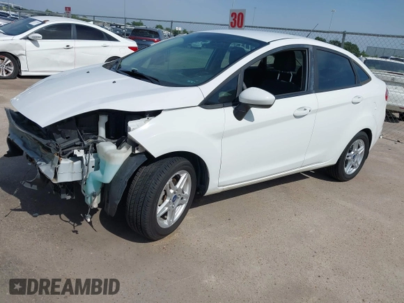 2017 Ford Fiesta SE z VIN 3FADP4BJ1HM126375, wystawiony jako IAAI lot #42244318 z przebiegiem 70 829 mil mil oraz . Historia ofert i sprzedaży dostępna na DreamBid. Obrazek 2.