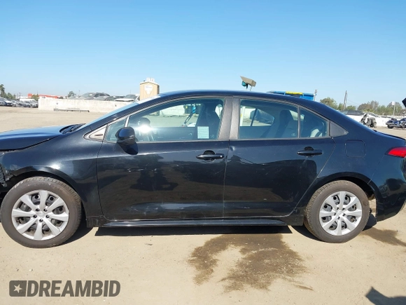 2021 Toyota Corolla LE with VIN 5YFEPMAE5MP200676, listed as a IAAI auction lot 42000746 with 40,457 mi miles and . Bid and sale history available at carsss.com. Image 14.