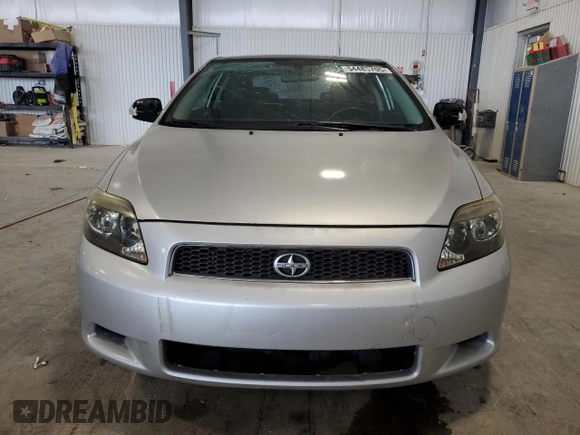 2006 Scion tC z VIN JTKDE167760090455, wystawiony jako Copart lot #54485705 z przebiegiem 161 510 mil mil oraz Szkoda całkowita • Salvage title. Historia ofert i sprzedaży dostępna na DreamBid. Obrazek 5.