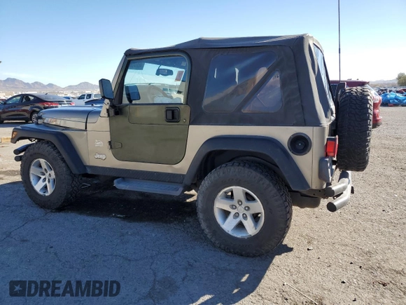 2003 Jeep Wrangler Sahara z VIN 1J4FA59S43P369233, wystawiony jako Copart lot #46517565 z przebiegiem 169 232 mil mil oraz Szkoda całkowita • Salvage title. Historia ofert i sprzedaży dostępna na DreamBid. Obrazek 2.