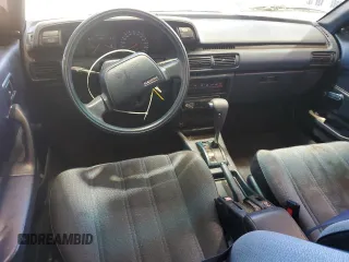 1991 Toyota Camry z VIN 4T1SV24E0MU402588, wystawiony jako Copart lot #82920114 z przebiegiem 124 644 mil mil oraz Szkoda całkowita • Salvage title. Historia ofert i sprzedaży dostępna na DreamBid. Obrazek 8.